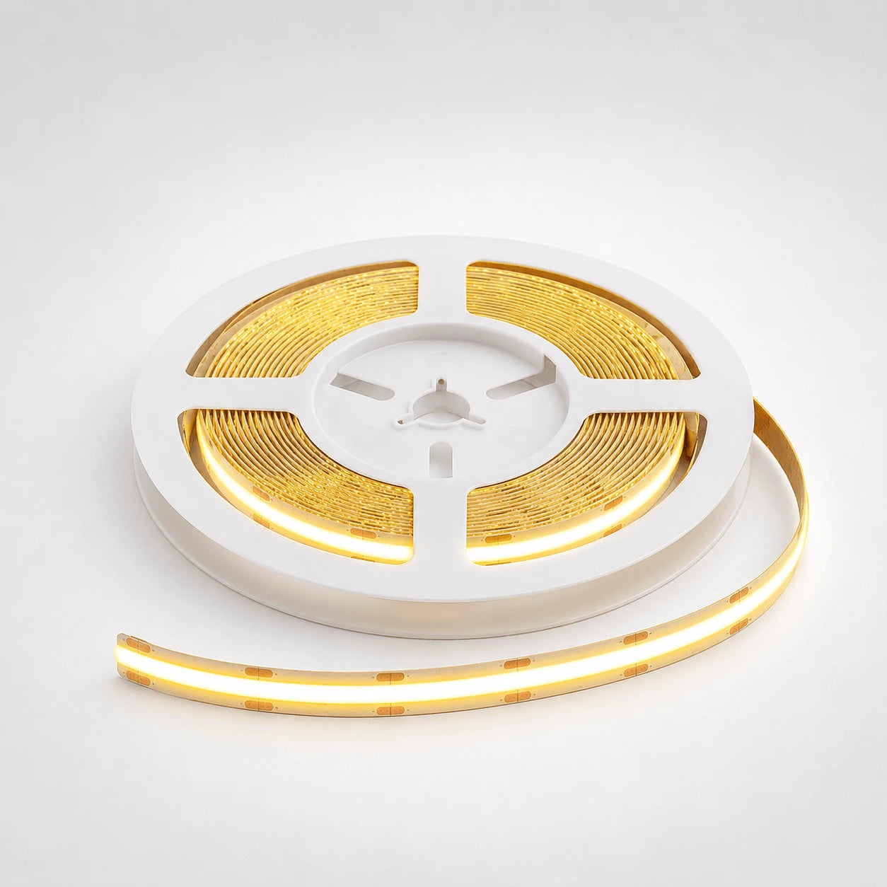 Roll of LED strip light on a white background